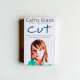 Cut: The true story of an abandoned, abused little girl who was desperate to be part of a family Cut: The true story of an abandoned, abused little girl who was desperate to be part of a family